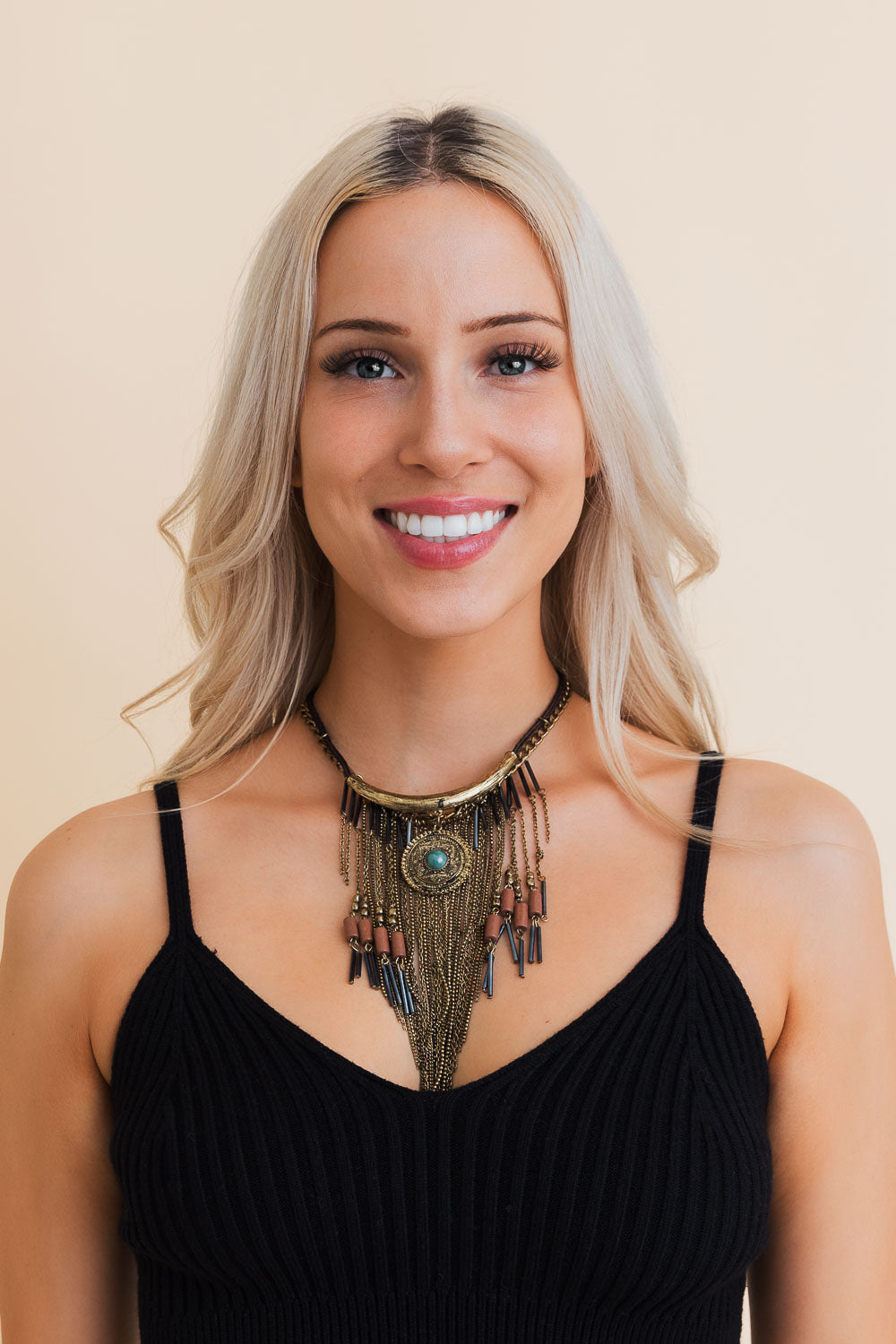 Leto Collection model wearing statement Boho Necklace, Boho Chic Jewelry, Spiritual pendant with fringe and turquoise