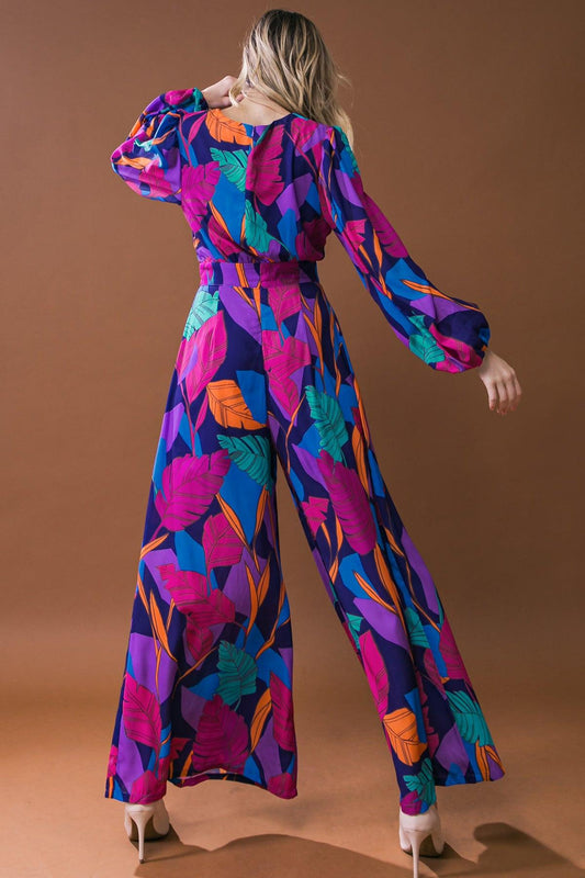 Woven Jumpsuit With Round Neckline Front Pant Pleat And Wide Leg Back Zipper