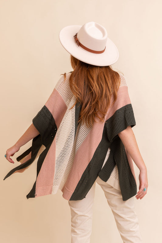 Leto Collection boho knit poncho for women in multicolored stripes, perfect for stylish layering
