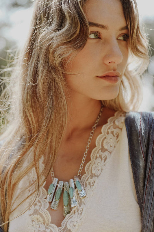 Leto Collection model wearing turquoise pendant statement necklace with silver chain Boho Necklace, Boho Chic Jewelry, Spiritual