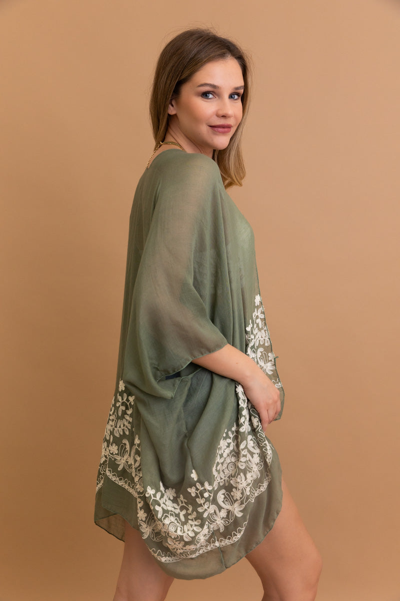 Lightweight floral embroidered sage kimono with detailed stitching.