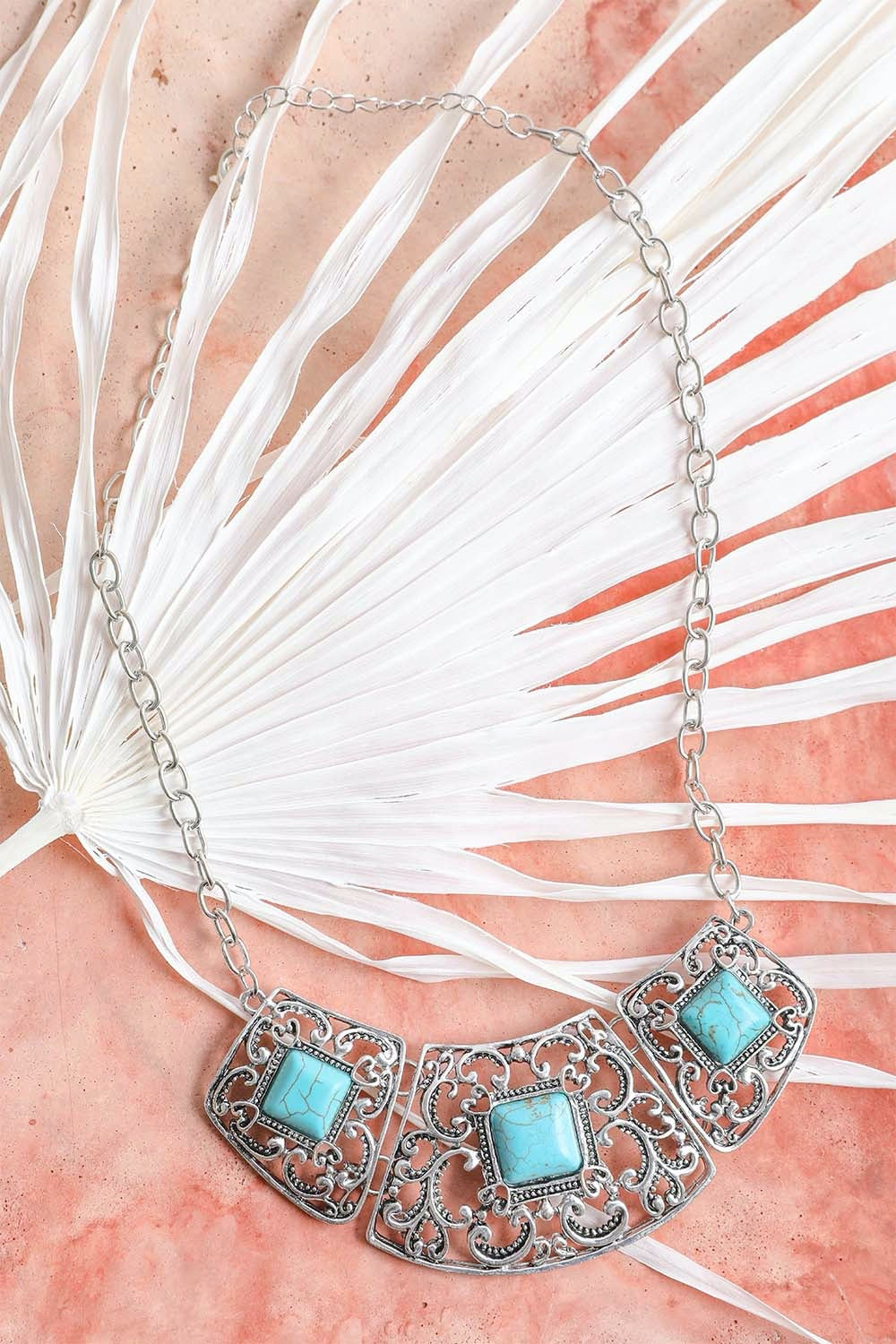 Leto Collection silver filigree necklace with turquoise stones on palm leaf backdrop Boho Necklace, Boho Chic Jewelry, Spiritual