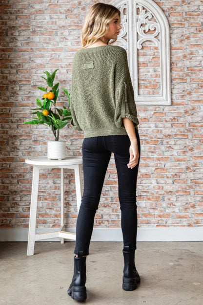 Stylish boho round neck sweater in olive green, perfect for casual outfits with black skinny jeans