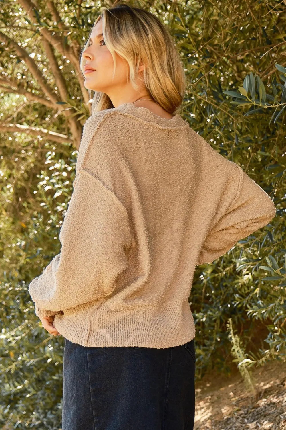 Cozy beige popcorn sweater cardigan for women with a relaxed fit and soft texture