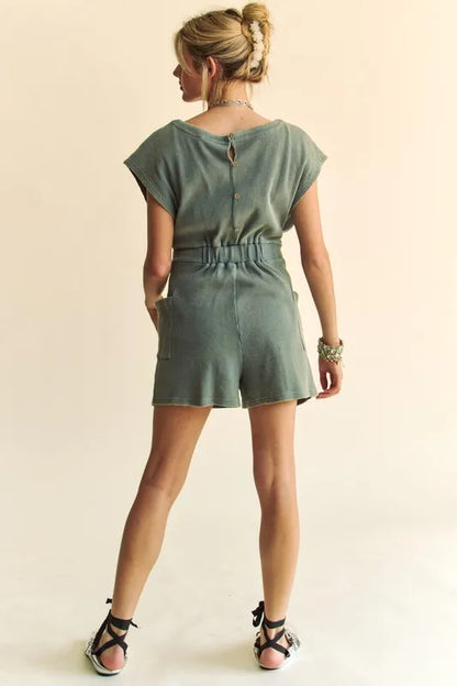 Back view of acid washed waffle knit romper with button detail and pockets, perfect for casual summer outings