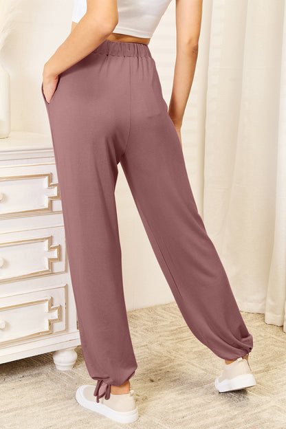 Trendsi Boho Drawstring Waist Pants in mauve with relaxed fit and ankle tie detail