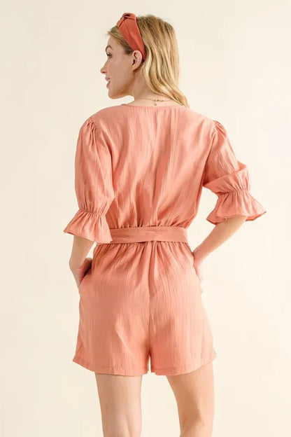 Trendsi boho flounce sleeve romper in coral with a cinched waist and back view