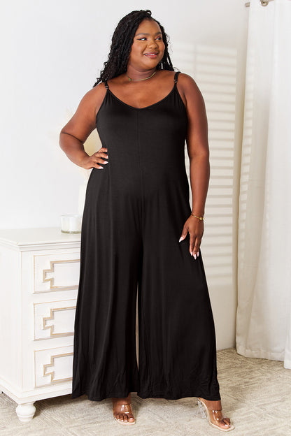 Chic black boho wide leg jumpsuit with adjustable straps for a comfortable fit