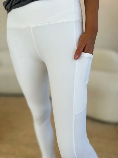 Trendsi wide waistband sports leggings in white with convenient side pocket for active wear