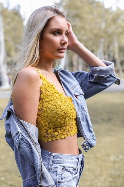 Leto Collection crochet daisy bralette in yellow, perfect for a stylish summer outfit with denim jacket