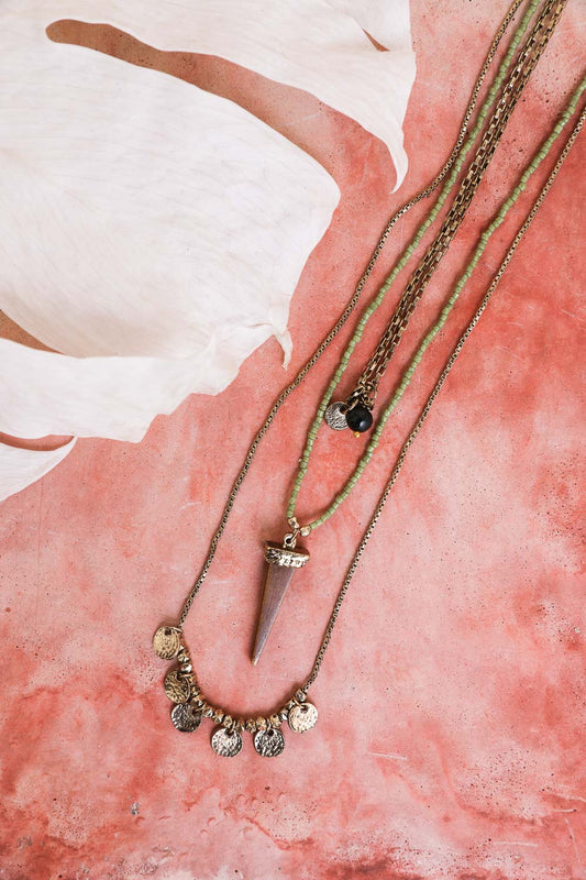 Leto Collection layered Boho Necklace, Boho Chic Jewelry, Spiritual stone pendant with coin charm necklaces on pink background
