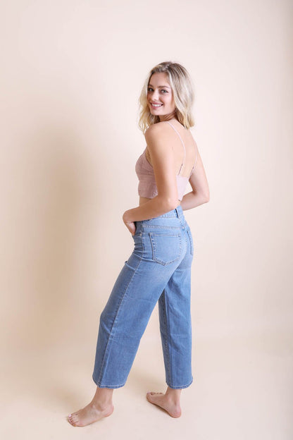 Leto Collection stretchable brami top for women styled with high-waisted jeans for a casual look