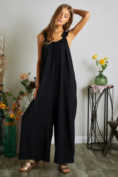Trendsi Plus Size Boho Jumpsuit in Black with a Relaxed Fit and Stylish Strap Detail