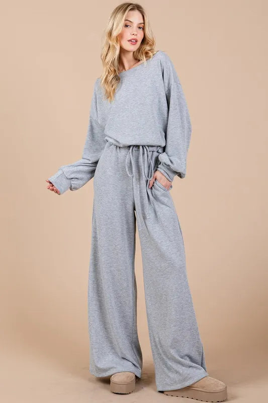 Trendsi boho long sleeve jumpsuit in gray with wide legs and adjustable waist for comfortable style