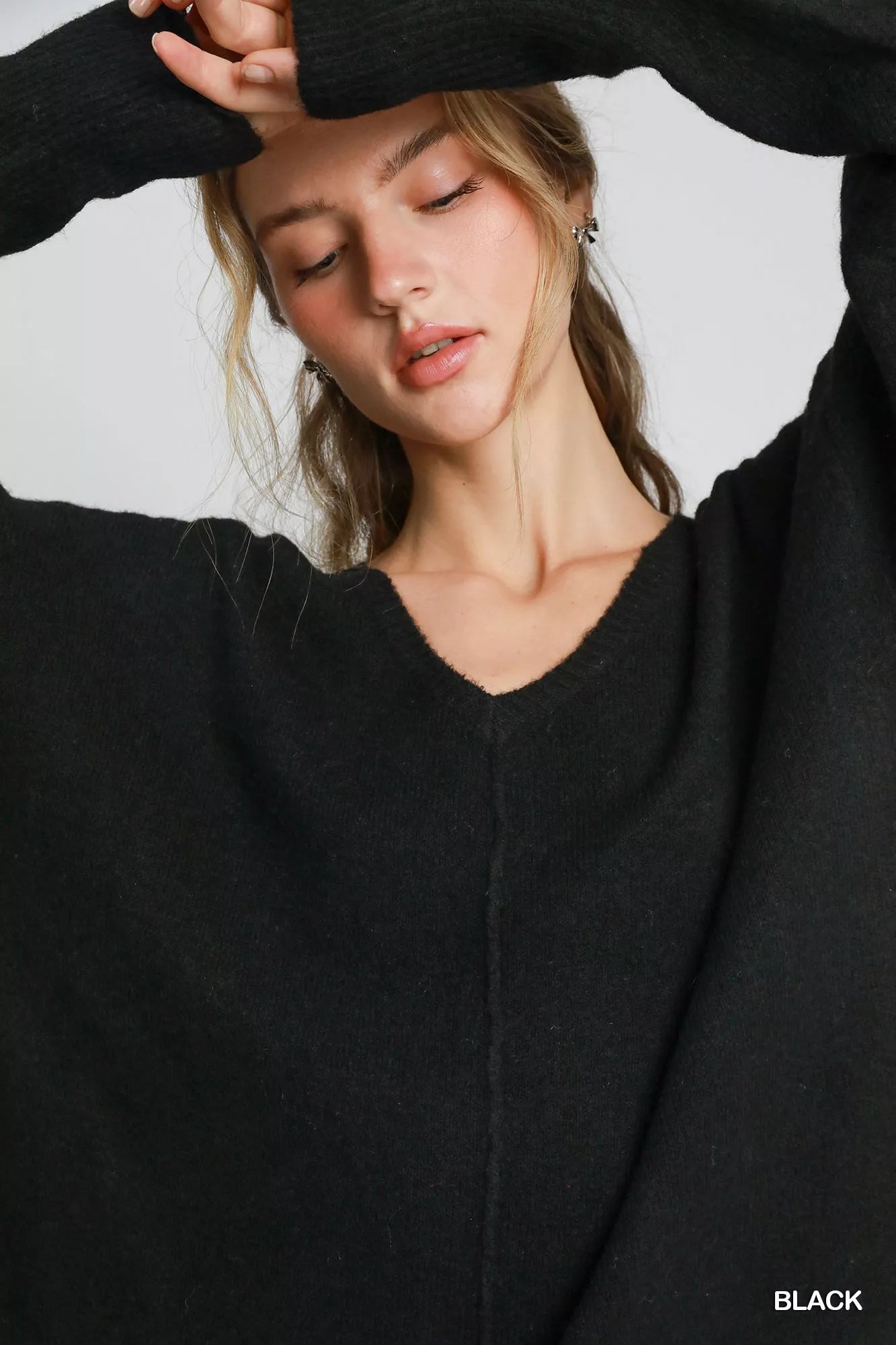 Umgee wool blend pullover sweater in black, featuring a V-neck and relaxed fit for comfort