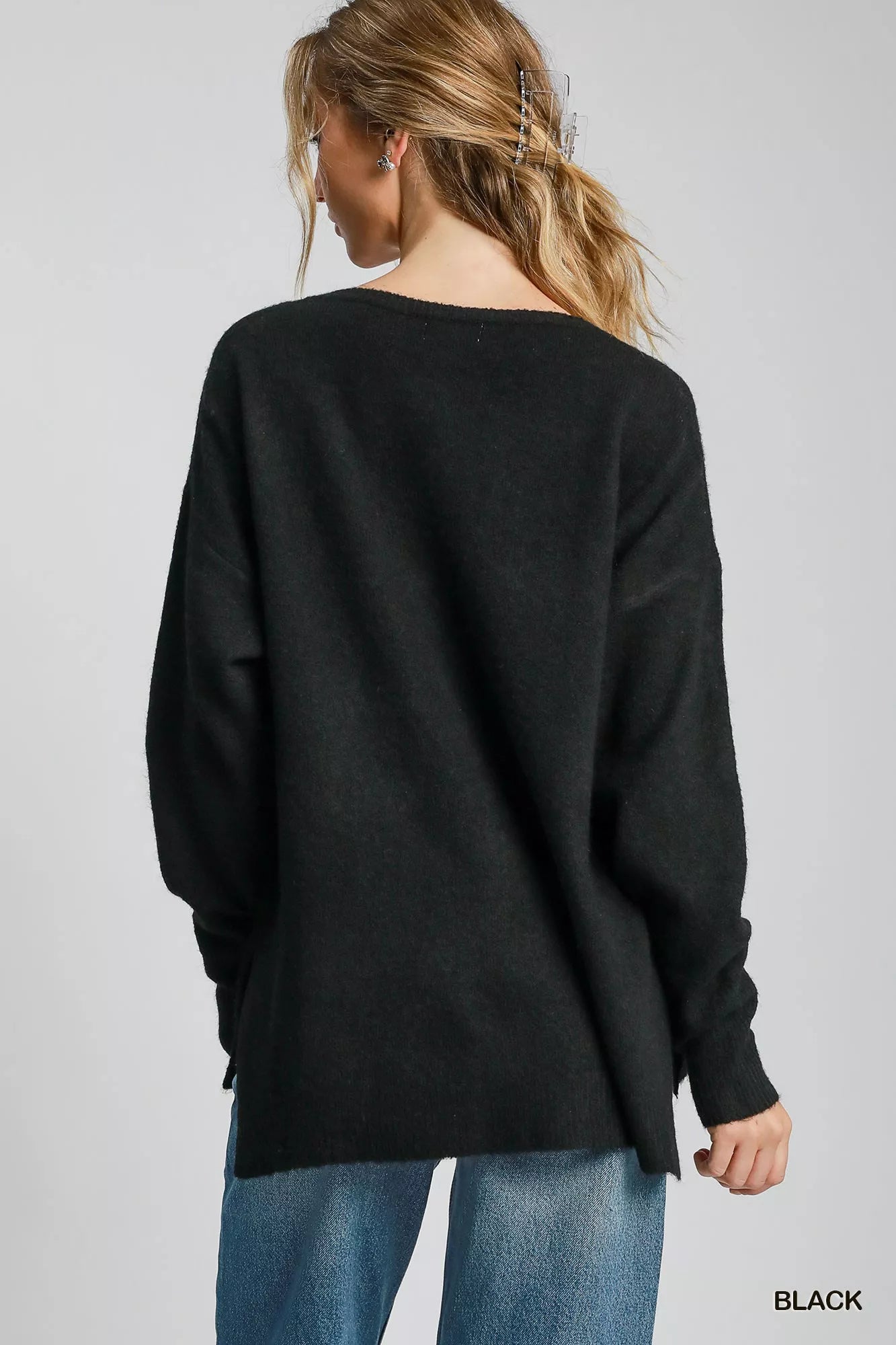 Umgee wool blend pullover sweater in black with a relaxed fit and side slits for comfort