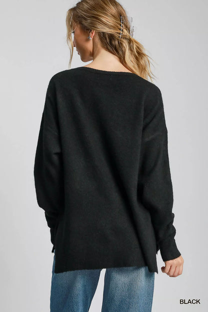 Umgee wool blend pullover sweater in black with a relaxed fit and side slits for comfort