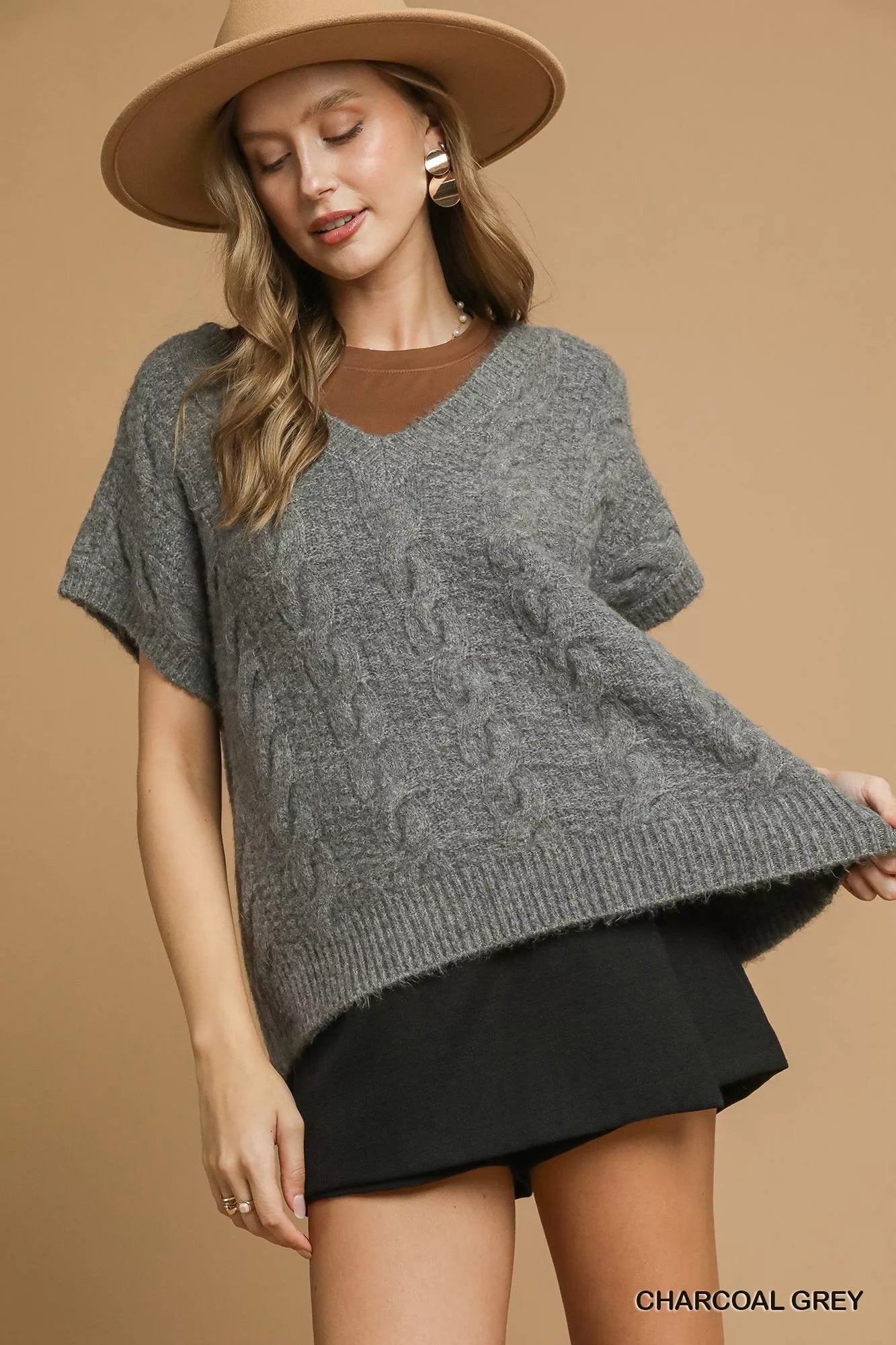 Stylish Umgee cable knit sweater in charcoal grey with short sleeves, perfect for casual outfits