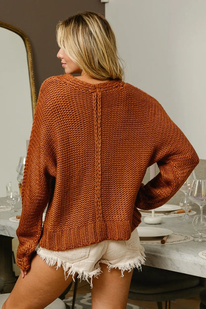 Trendsi boho V-neck cable knit sweater in burnt orange with a cozy oversized fit