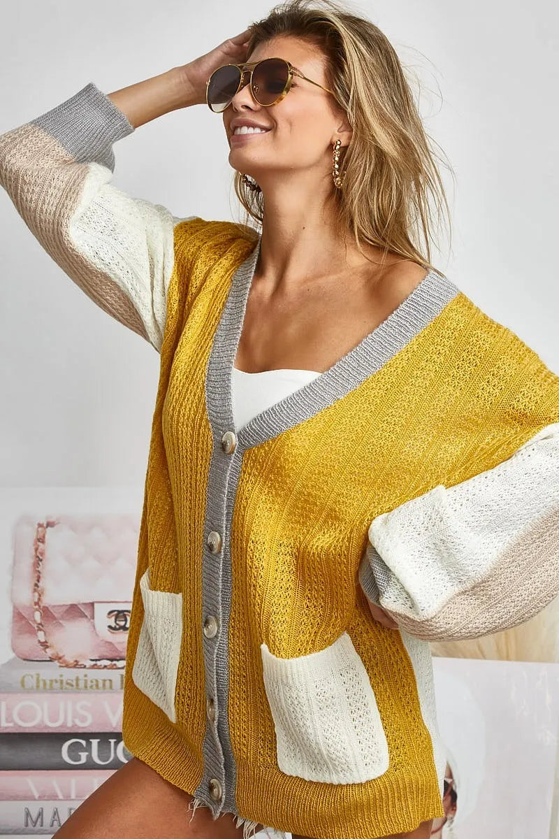 Trendsi Boho Color Block Cardigan Sweater with a Loose Fit and Button Closure in Warm Tones