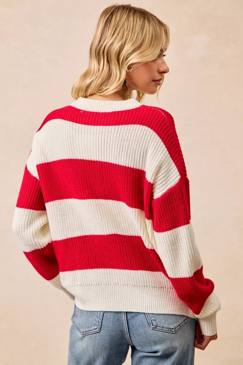 Stylish Merry Christmas sweater for women featuring red and white stripes, perfect for holiday celebrations
