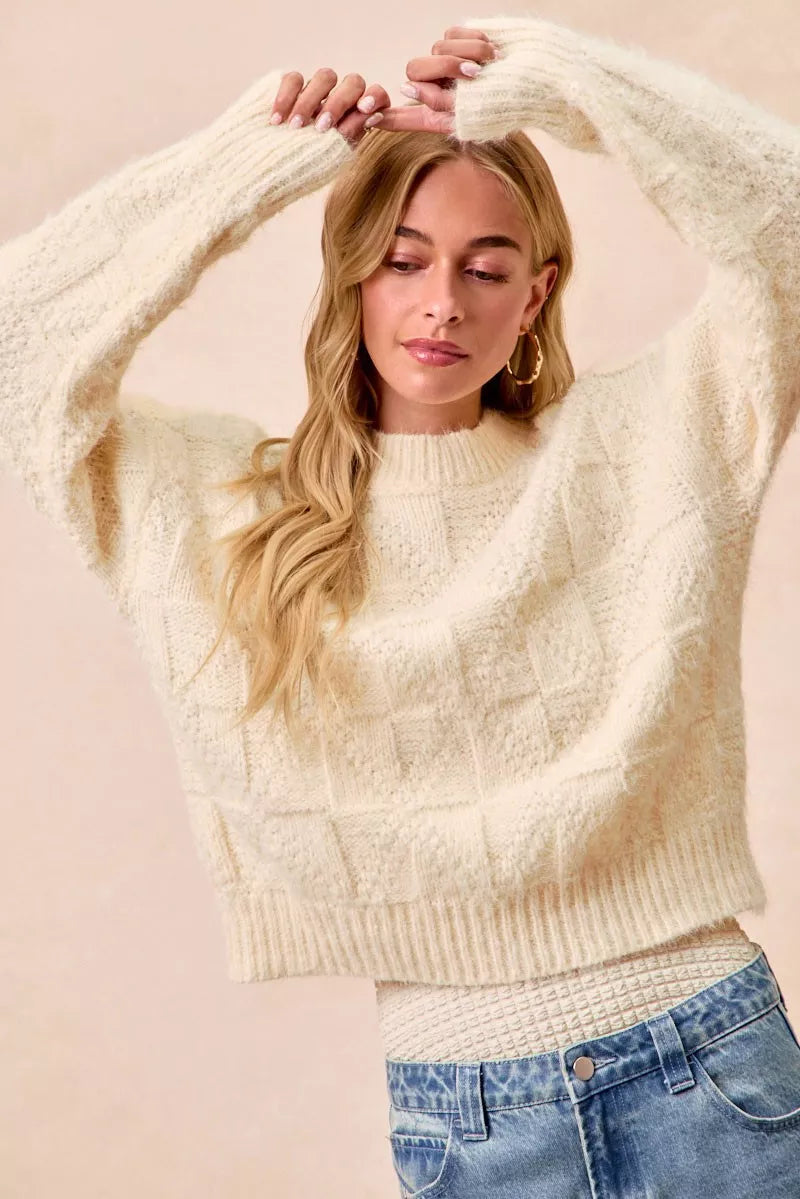 Trendsi checker board drop shoulder sweater in cream color with textured fabric for a cozy look