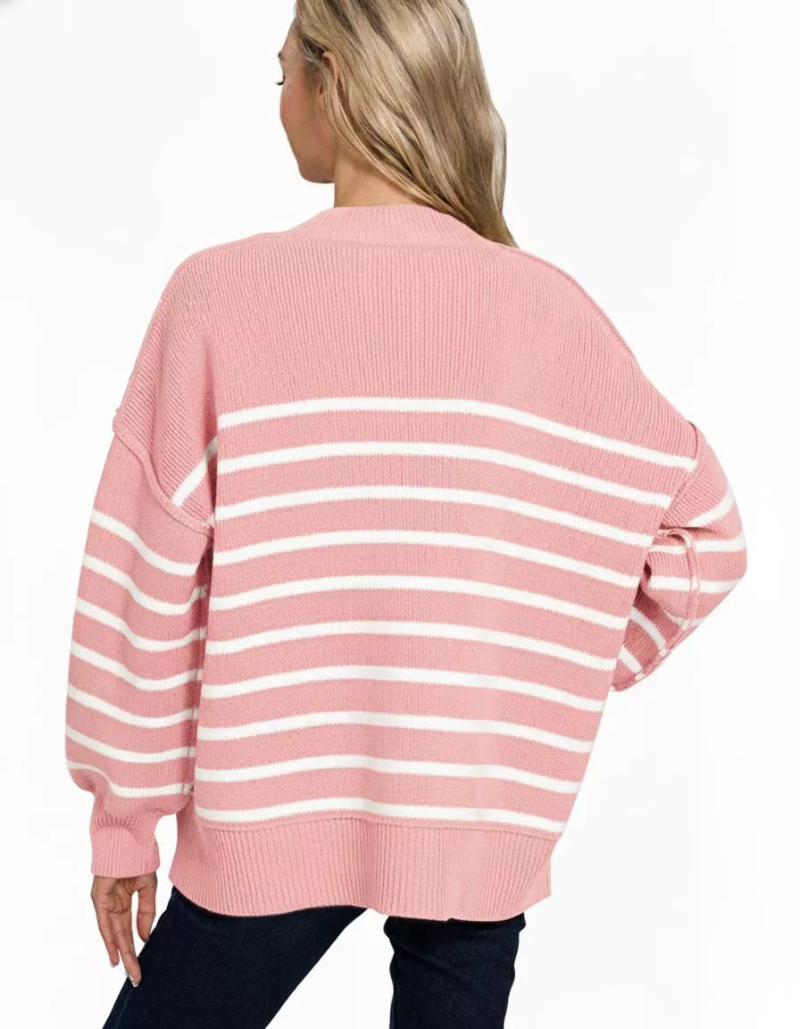 Pink striped oversized sweater for women featuring white stripes and relaxed fit for casual style