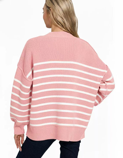 Pink striped oversized sweater for women featuring white stripes and relaxed fit for casual style