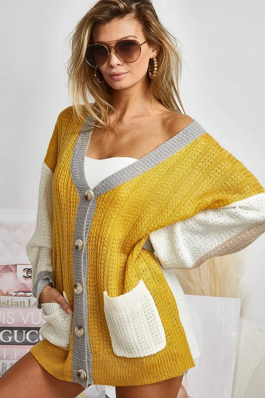 Trendy boho color block cardigan sweater in yellow and white with oversized fit and buttons