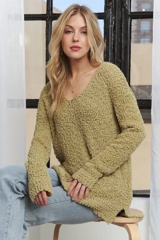 Trendsi boho v neck sweater in olive green with a relaxed fit and textured fabric