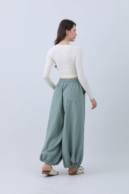 Leto Collection boho linen pants for women in soft green with elastic waist and wide leg design