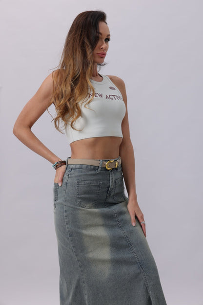 Stylish boho suede belt for women worn over a long denim skirt for a trendy look