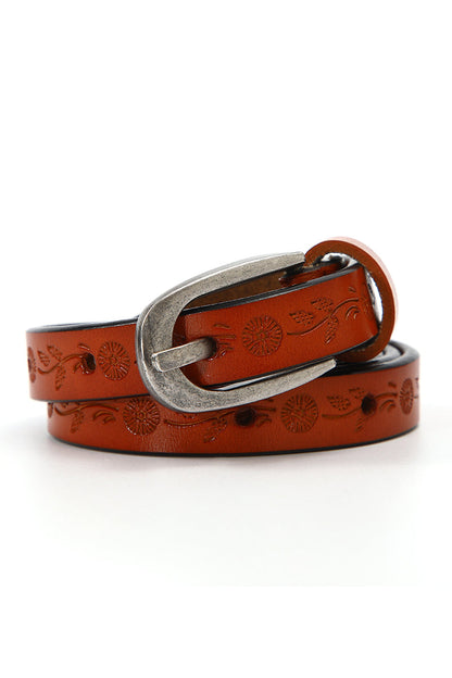 Floral embossed skinny leather belt in orange with a silver buckle design for stylish outfits