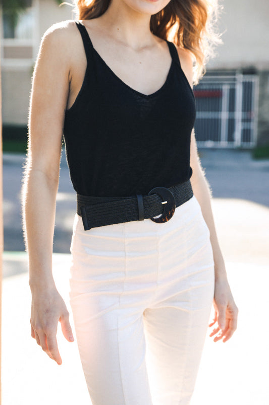 Leto Collection boho basketweave waist cincher belt styled with a sleek outfit for a chic look