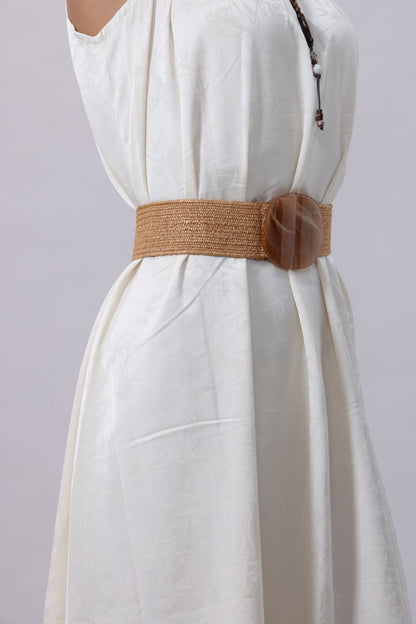 Stylish boho woven belt with buckle, designed to accentuate any outfit with a unique touch