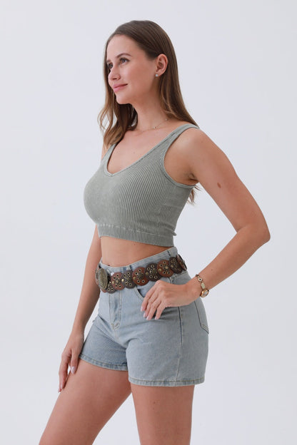 Leto Collection boho western belt for women showcased on a model with a cropped top and denim shorts
