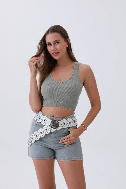 Leto Collection edgy hollow-out belt styled with a gray ribbed crop top and denim shorts