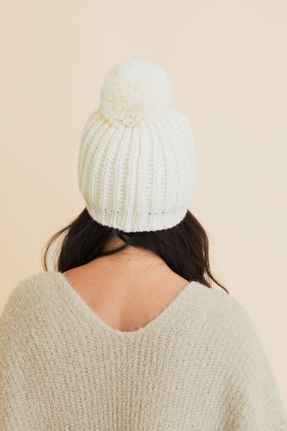 Leto Collection Chunky Cable Knit Pom Beanie in soft white, featuring a cozy pom pom on top
