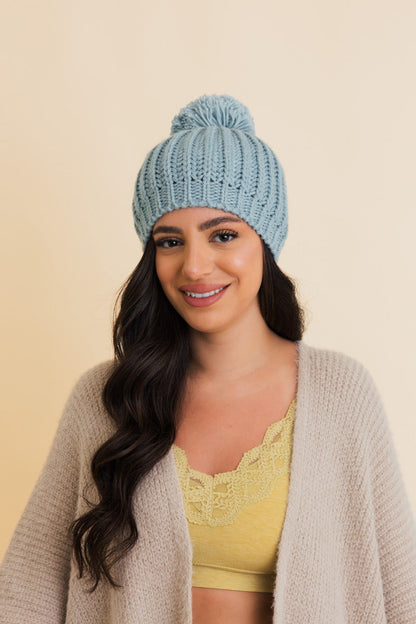 Leto Collection Chunky Cable Knit Pom Beanie in Light Blue, perfect for winter style and warmth