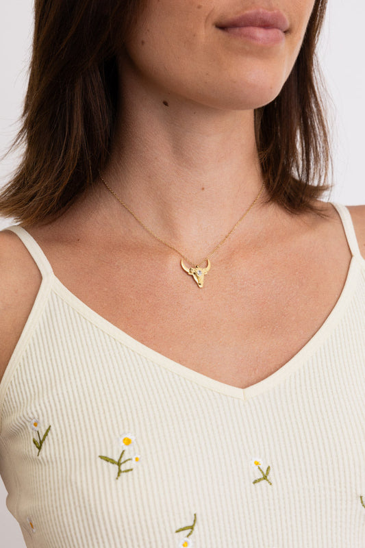 Gold bull skull pendant on thin chain over cream embroidered tank top on model Boho Necklace, Boho Chic Jewelry, Spiritual