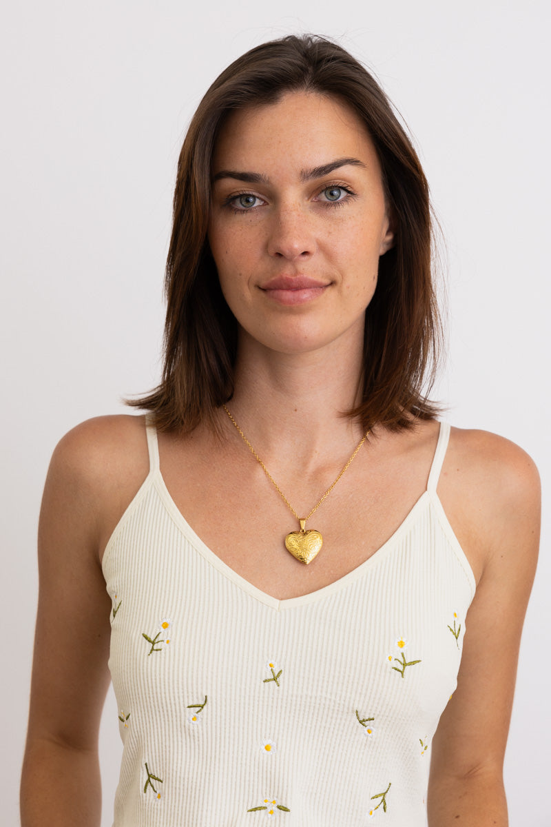 Boho Necklace, Boho Chic Jewelry, Spiritual gold heart pendant necklace worn by woman model for Boho Clothing and Accessories