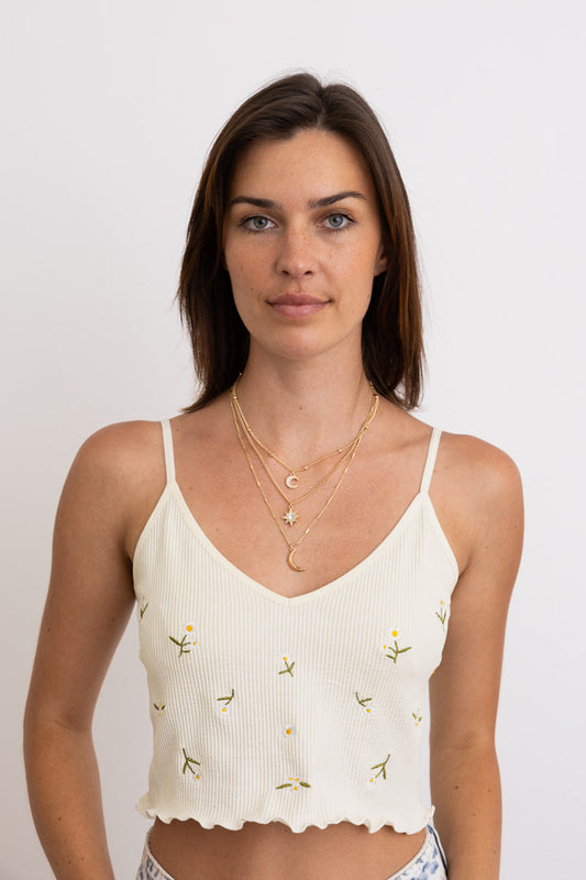 Leto Collection layered gold Boho Necklace, Boho Chic Jewelry, Spiritual moon and star pendant on model in cream crop top