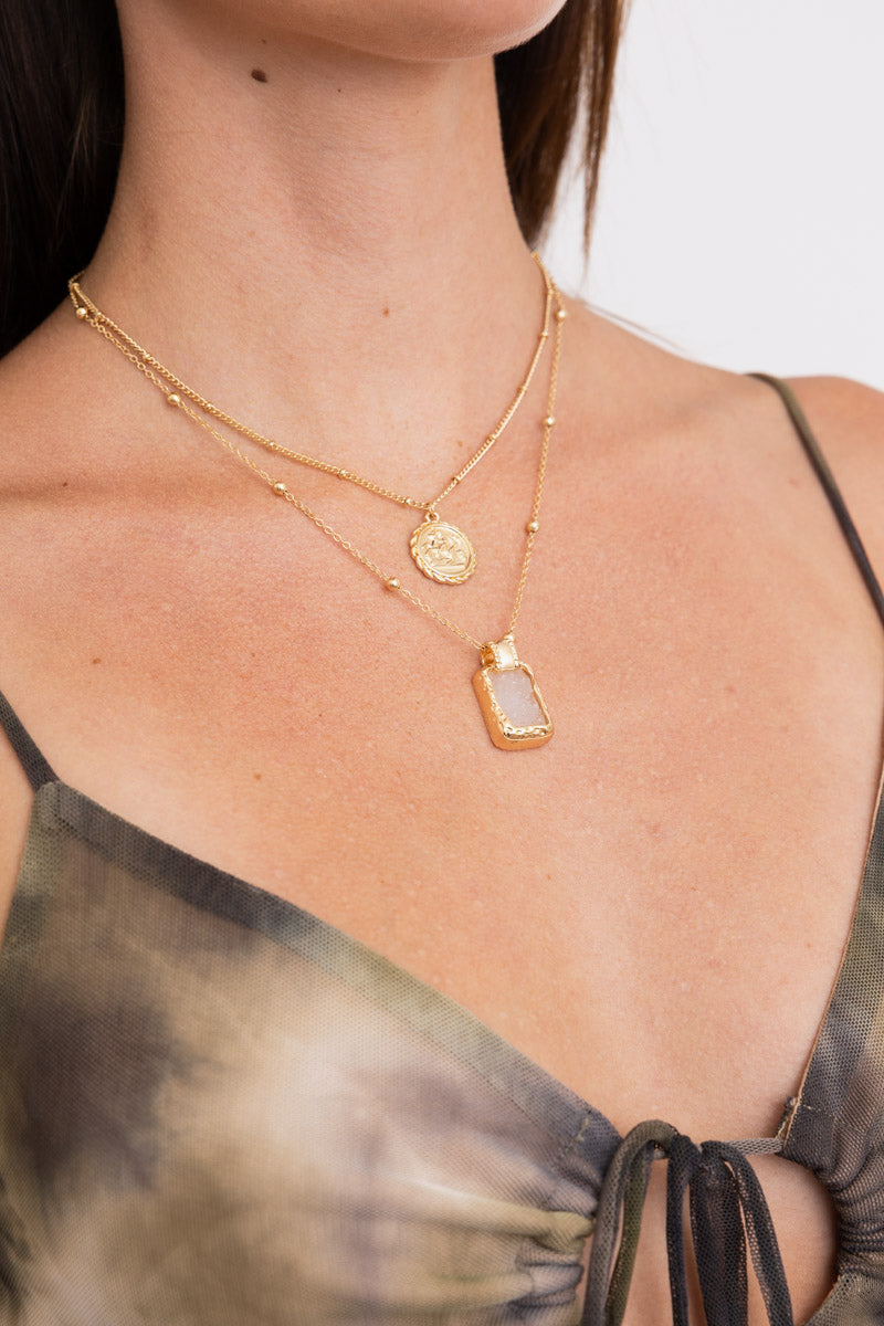 Gold layered coin and opal pendant necklace on neckline Leto Collection Boho Necklace, Boho Chic Jewelry, Spiritual
