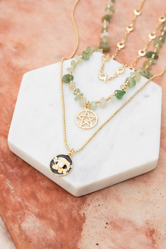 Leto Collection layered green aventurine and gold pendant necklaces on marble display Boho Necklace, Boho Chic Jewelry, Spiritual.