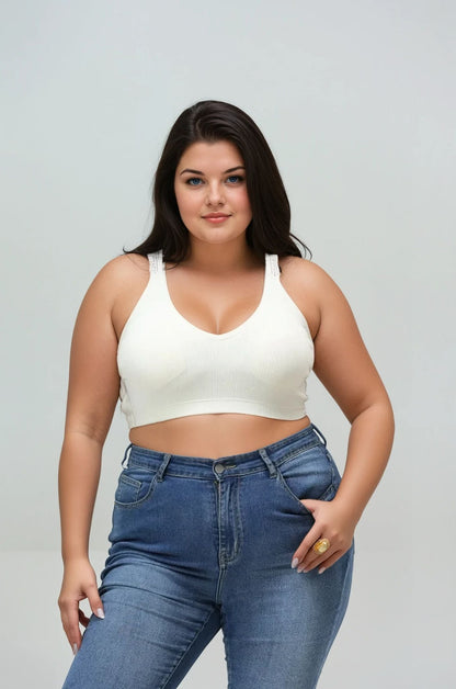 Leto Collection plus size seamless bralette in cream color worn with high-waisted jeans