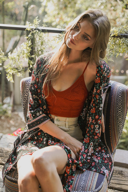 Leto Collection Stretchable brami top for women in rust color, layered under a floral kimono