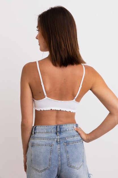 Lettuсe edge bralette in white with adjustable straps and a stylish back design