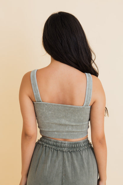 Back view of Leto Collection ribbed bralette for women in soft green color, featuring a comfortable fit