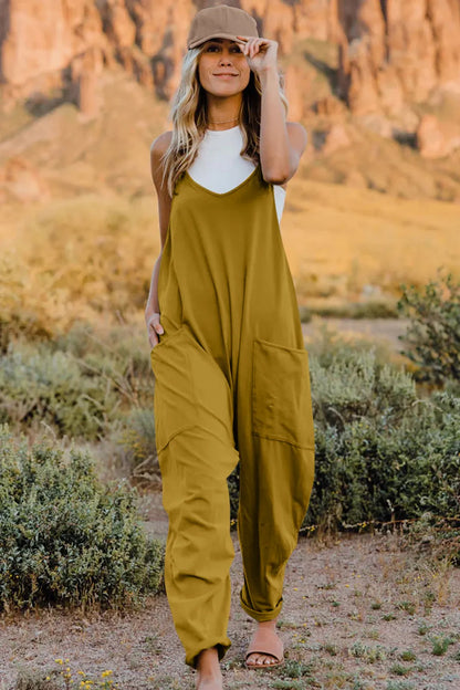 Trendsi boho v-neck sleeveless jumpsuit in olive green with convenient pockets for a stylish look