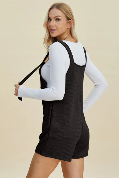 Trendsi boho sleeveless romper in black with adjustable straps and a stylish design